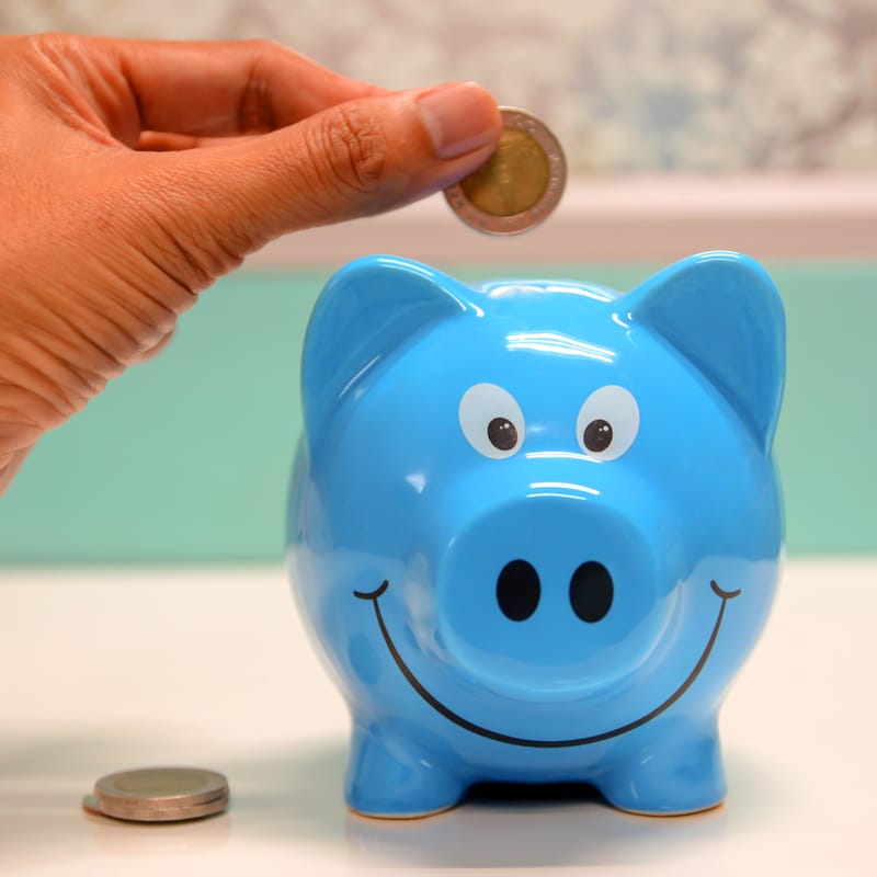 Piggy bank with coins